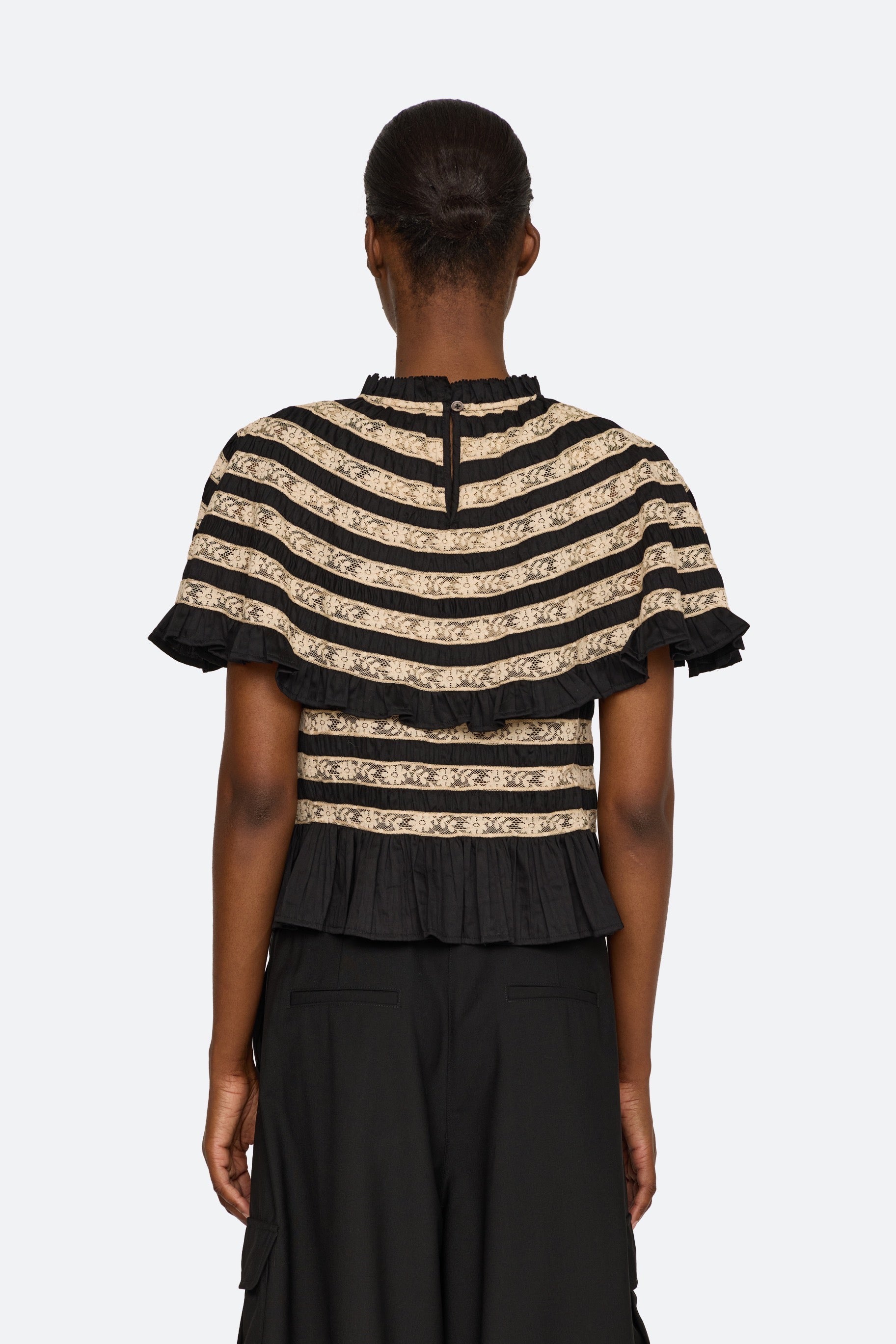 JEMIMA SLVLESS CAPE TOP (D1)